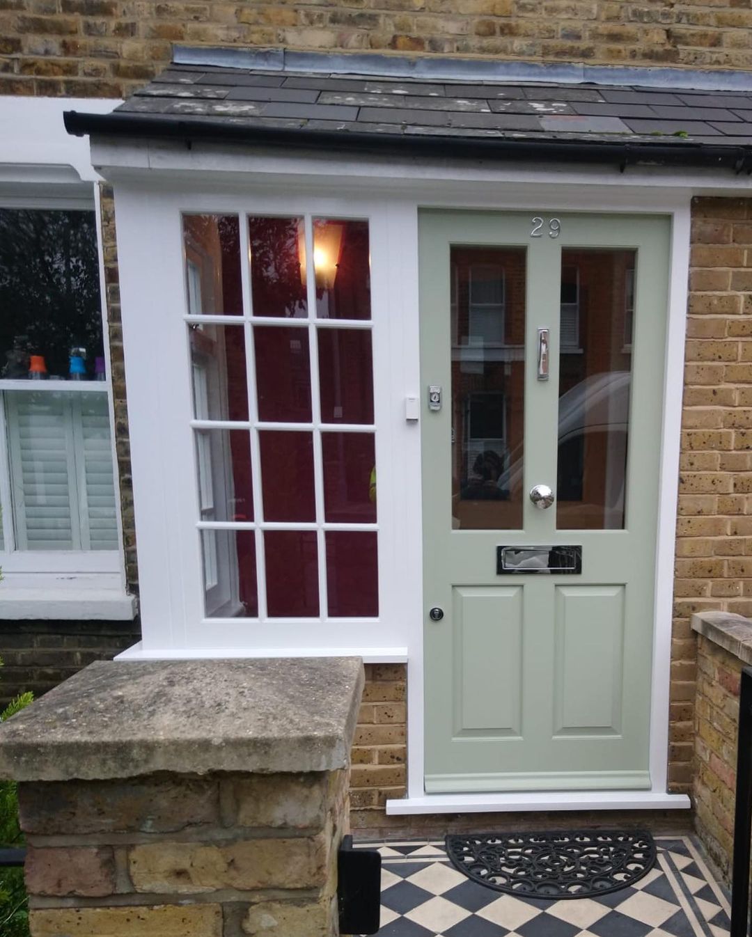 Entrance door and frame with sidelight windows fitted in London