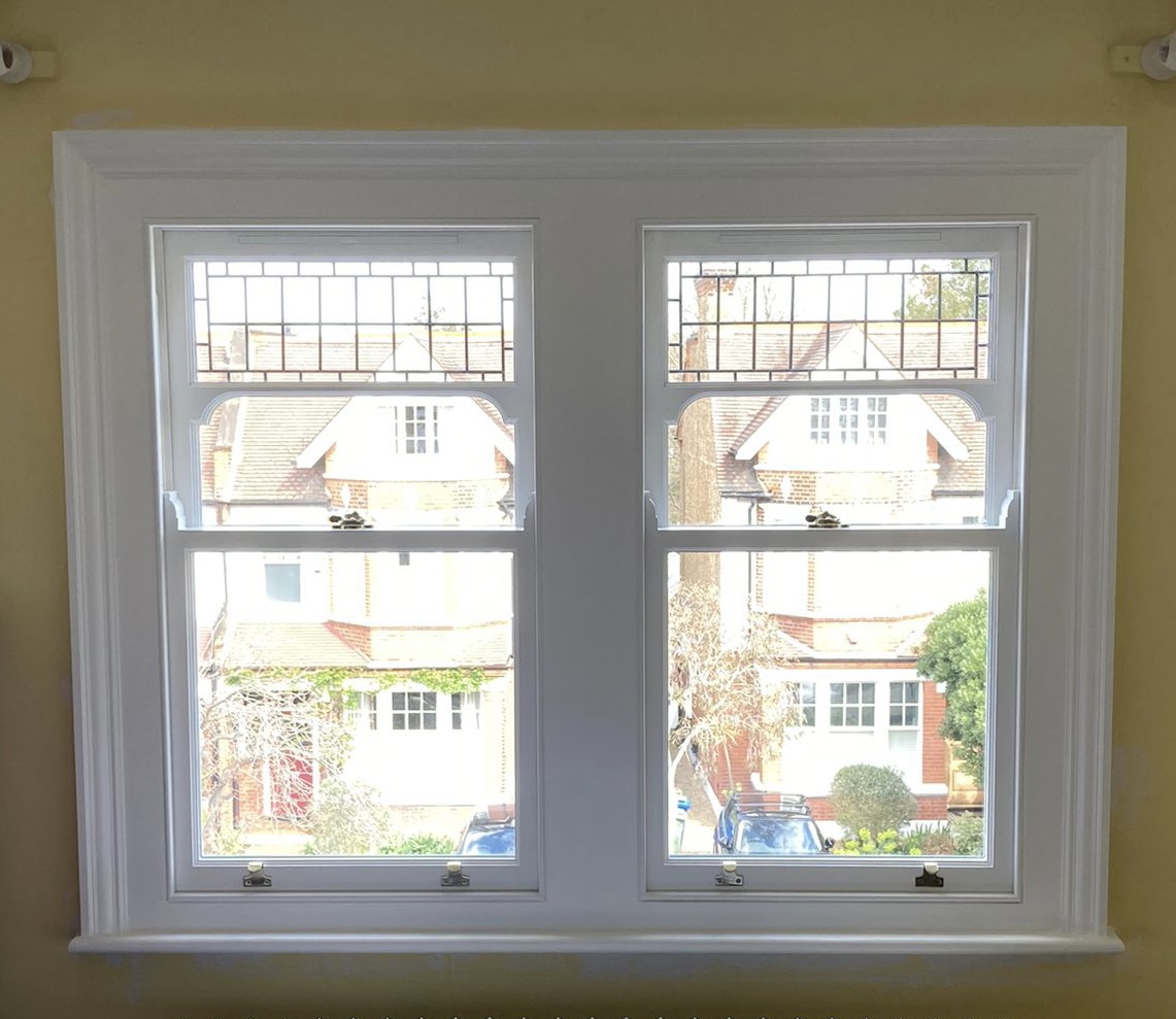 Two decorative glass windows fitted in London
