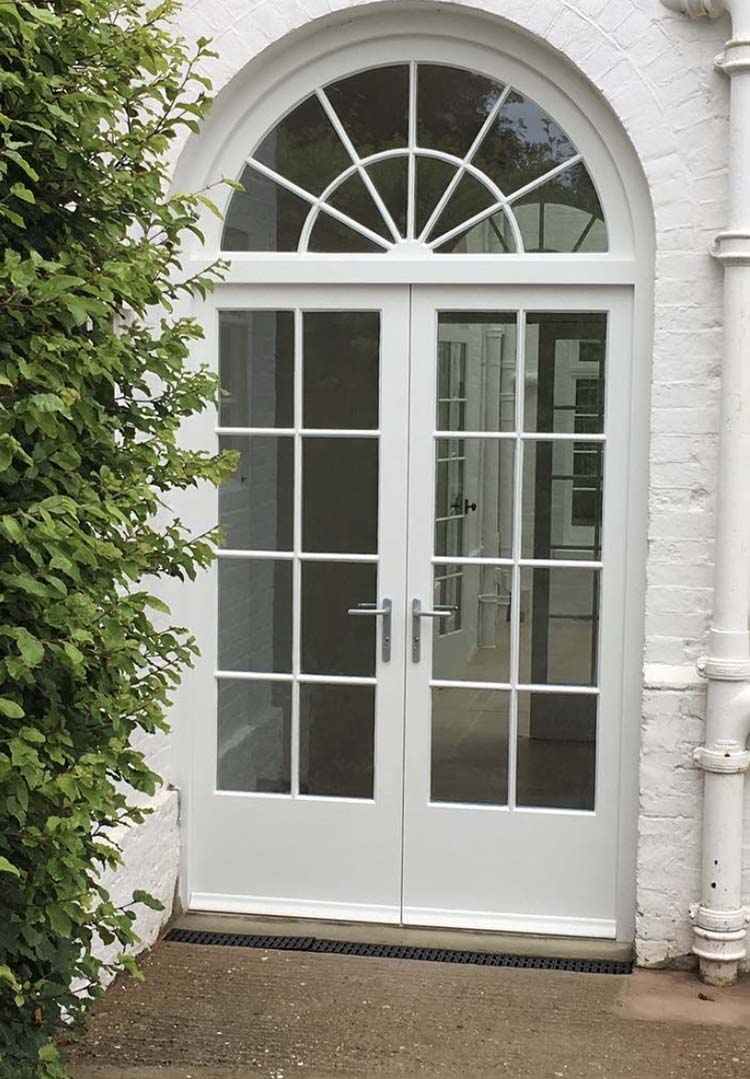 Patio doors with arched window