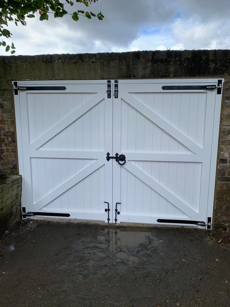Barn doors with black accents fitted in Greenwich