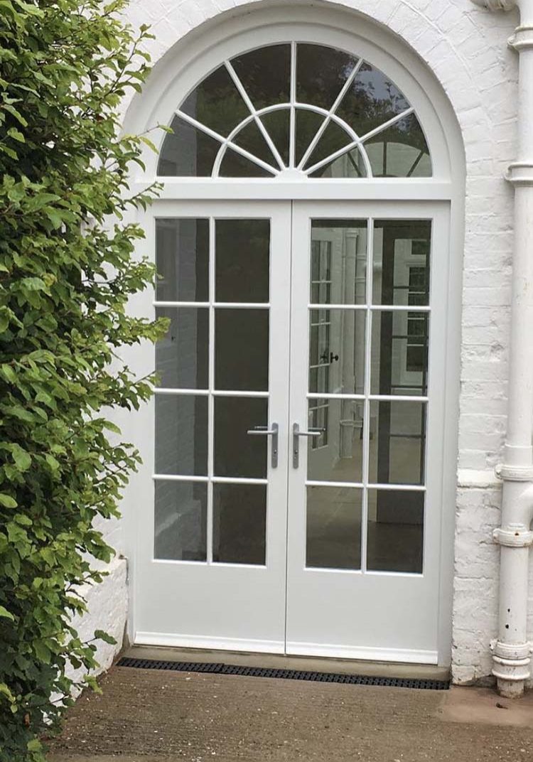 Patio doors with arched window